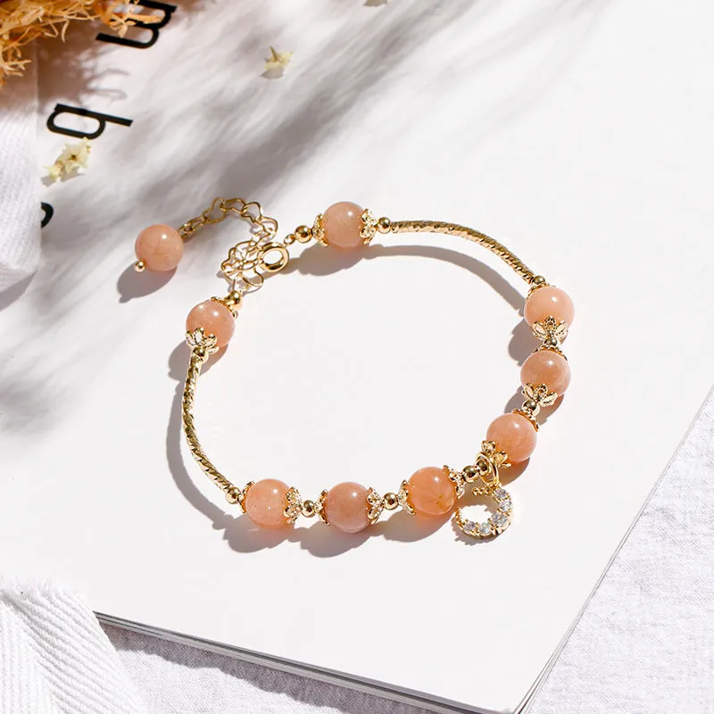 Fortune's Favor Sterling Silver Bracelet with Orange Sunstone and Zircon Moon Beads