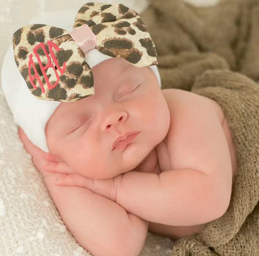 ilybean Lux Leopard Bow Baby Newborn Girl Hospital Hat - White Hat with Leopard Fabric Bow (Monogram Optional)