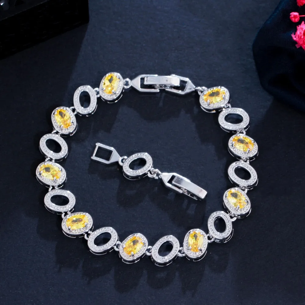 Luxury Jewelry Oval Crystal Bangle Bracelet for a Friend with Yellow Zircon in Silver Color