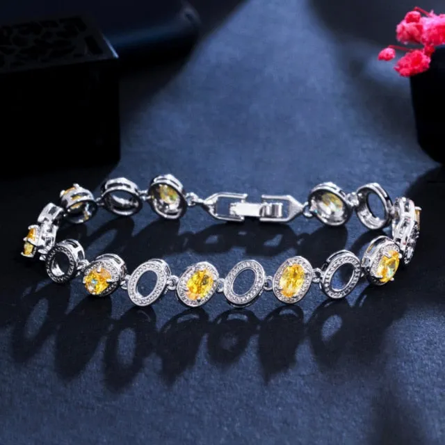 Luxury Jewelry Oval Crystal Bangle Bracelet for a Friend with Yellow Zircon in Silver Color