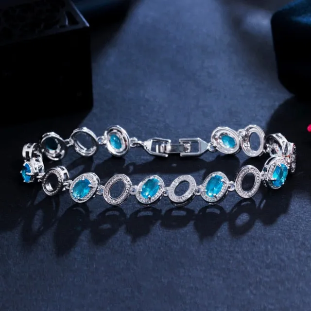 Luxury Jewelry Oval Crystal Bangle Bracelet for a Friend with Yellow Zircon in Silver Color