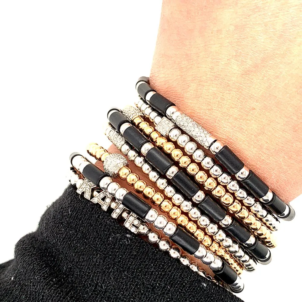 White Gold and  Black Onyx Bead Stretch Bracelet
